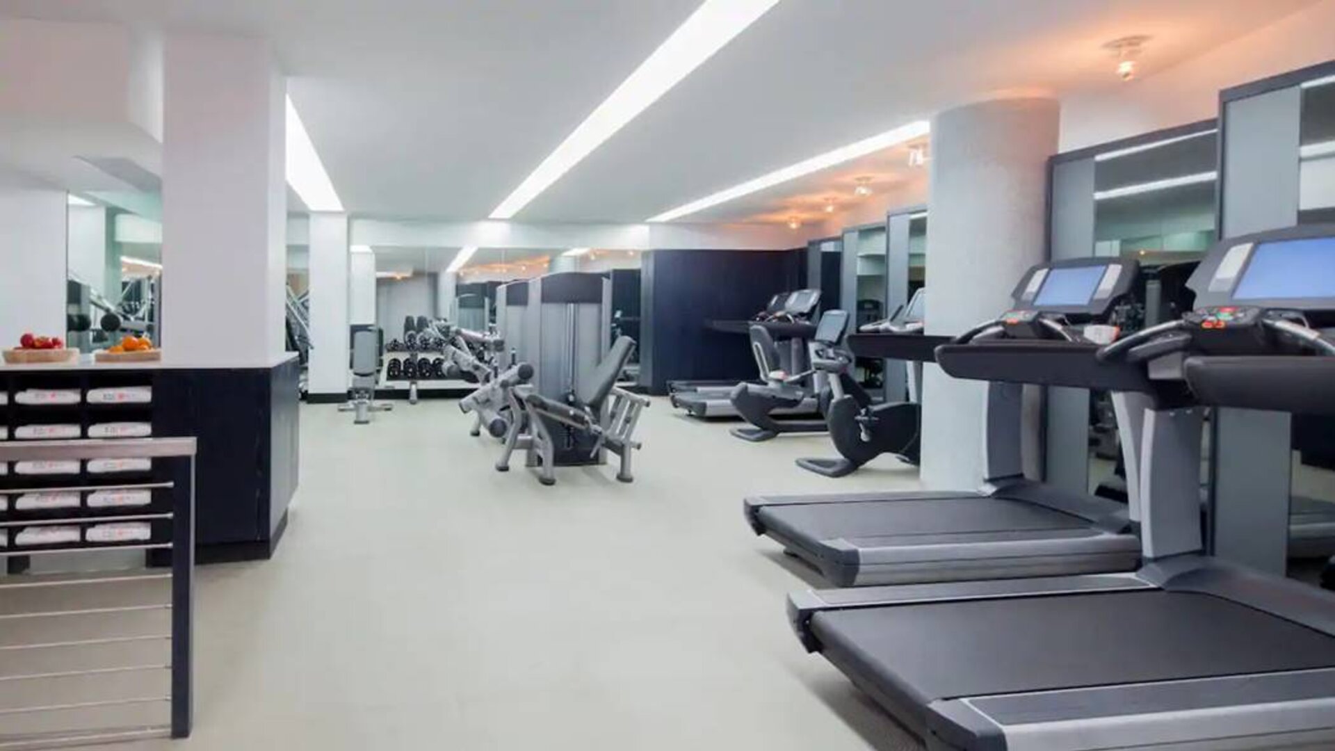The hotel fitness center, featuring a variety of exercise equipment.