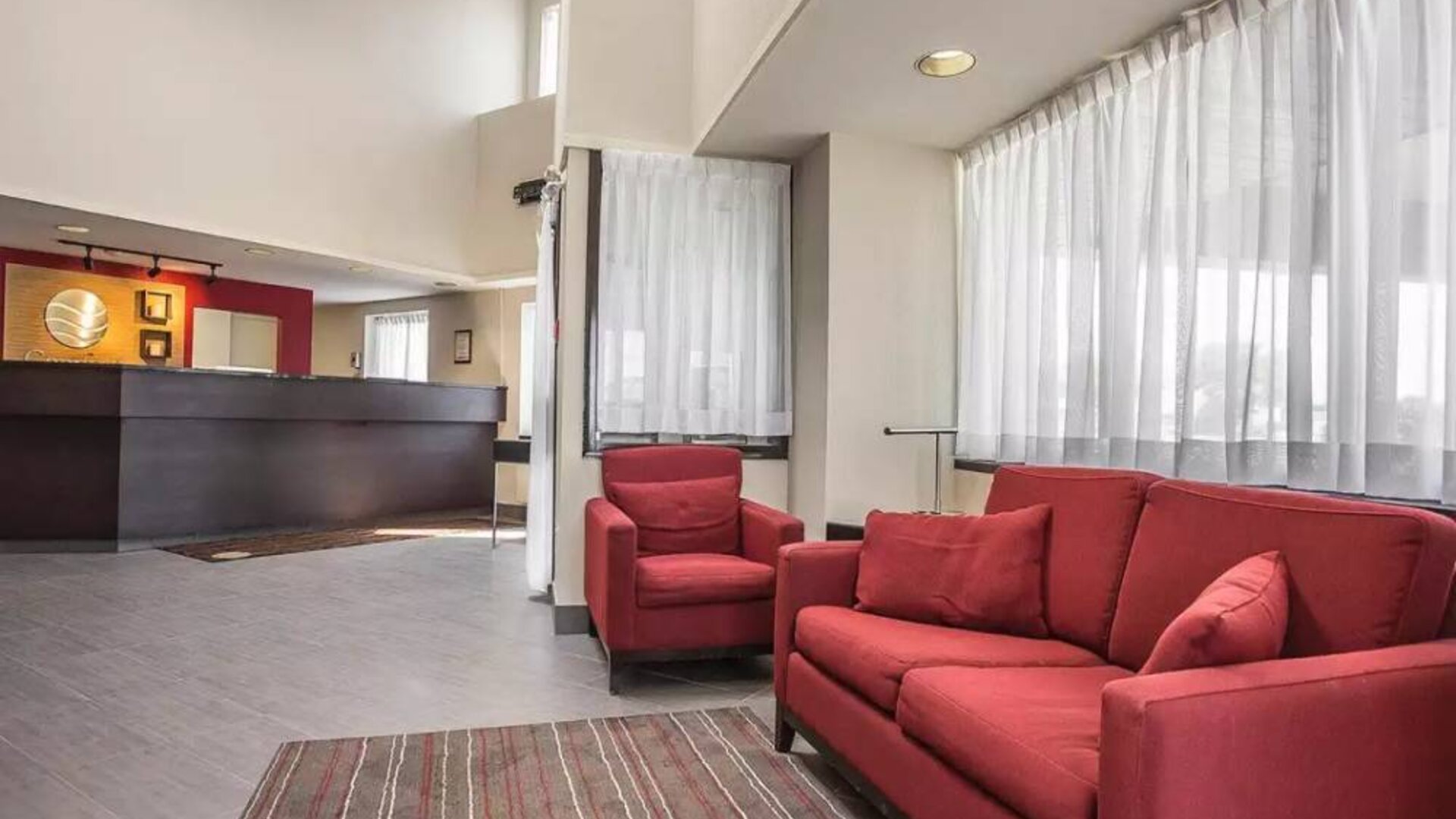 The hotel’s lobby has comfortable seating for guests to socialize and relax.