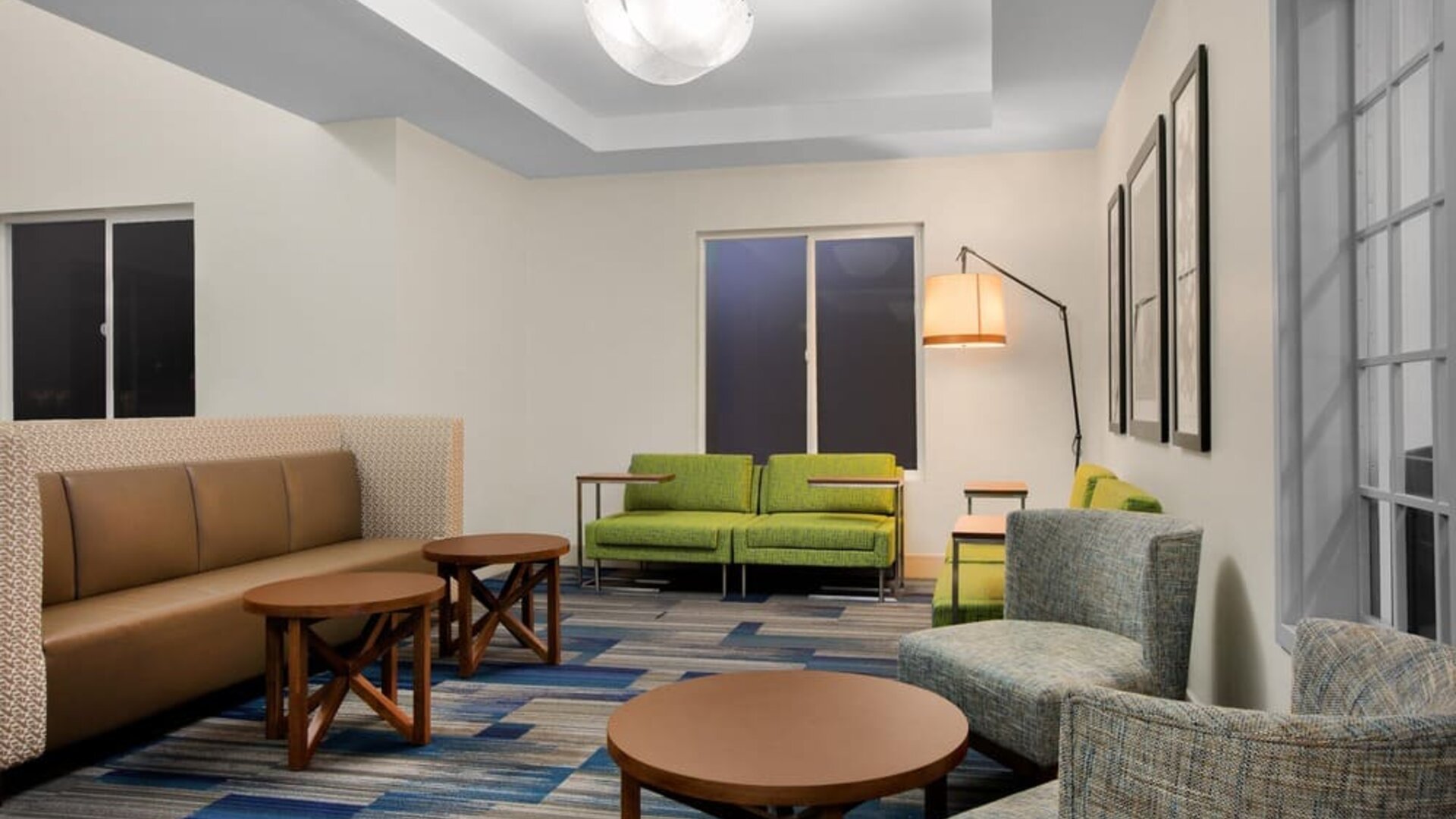 Comfortable lobby and coworking space at Holiday Inn Express & Suites Ontario.