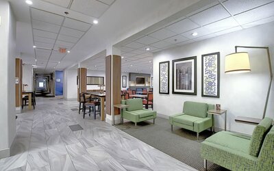 Comfortable lobby and coworking space at Holiday Inn Express & Suites Airport-Calgary.