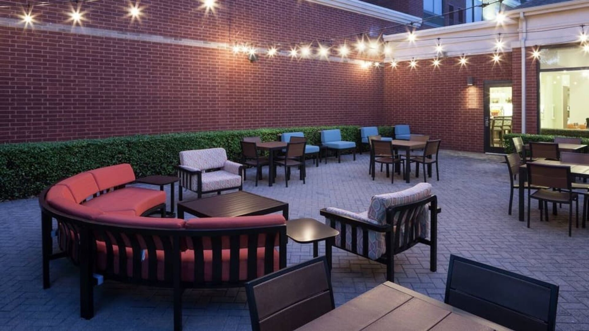 Comfortable outdoor coworking space at Hilton Garden Inn Dallas/Allen.