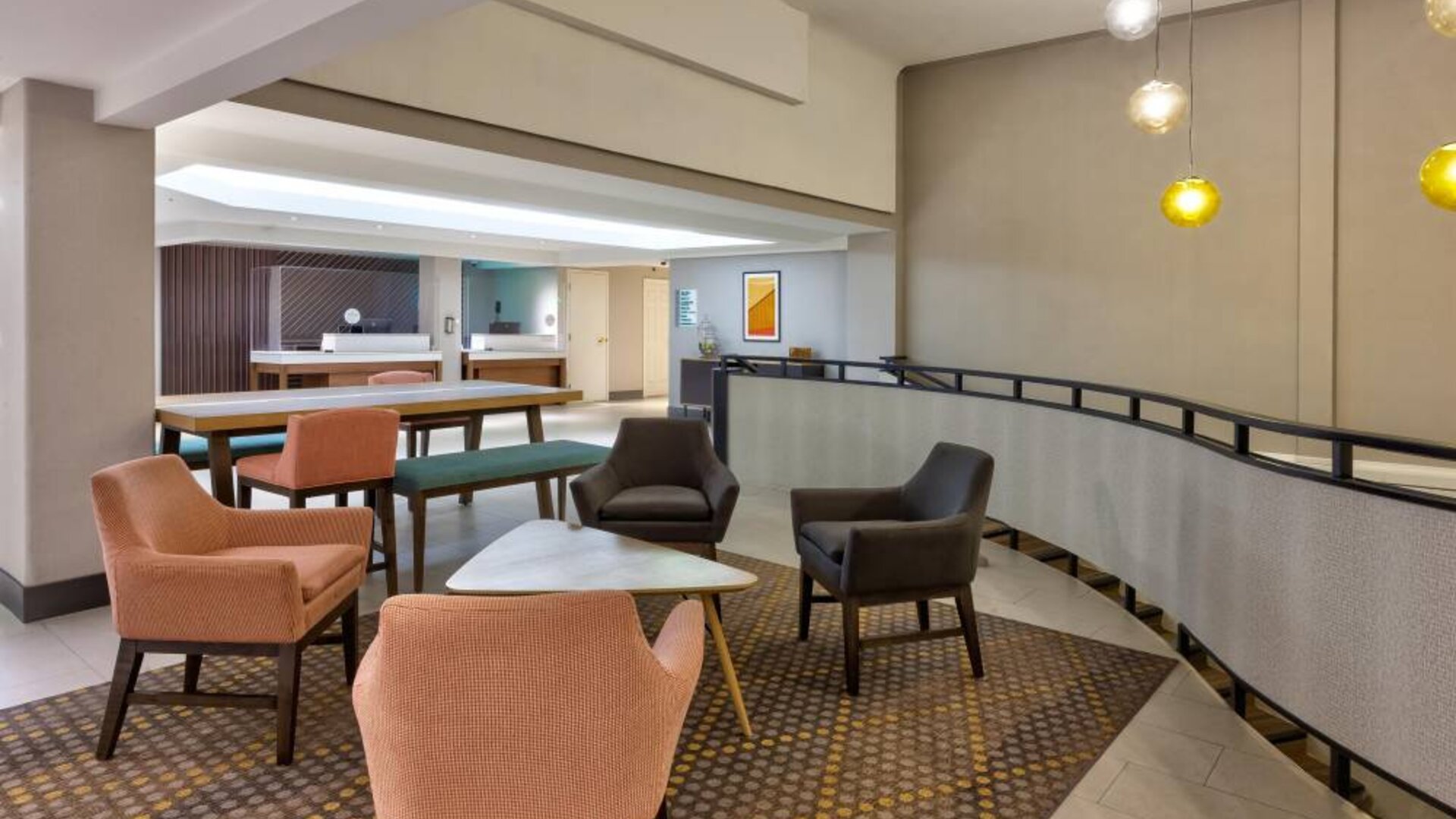 The hotel’s lobby lounge offers comfortable seating and coffee tables.