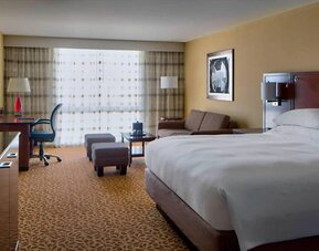 Day use room with work desk and sofa at Houston Marriott South At Hobby Airport.