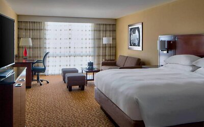 Day use room with work desk and sofa at Houston Marriott South At Hobby Airport.