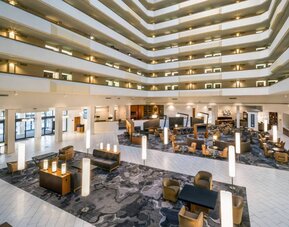 Lobby and coworking lounge at Houston Marriott South At Hobby Airport.