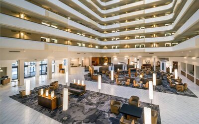 Lobby and coworking lounge at Houston Marriott South At Hobby Airport.