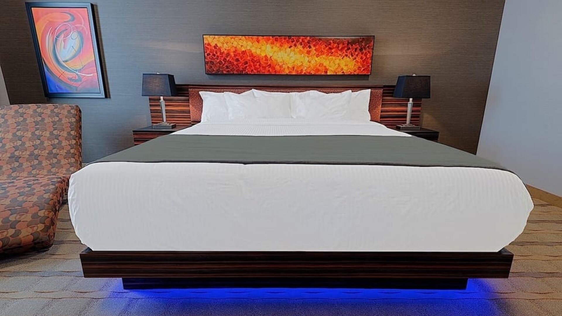 Luxurious and funky style delux king bed at Hotel Clique Calgary Airport.