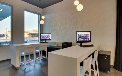 Business center with PC, internet, and printer at The Rose Hotel Chicago O’Hare, Tapestry Collection By Hilton.