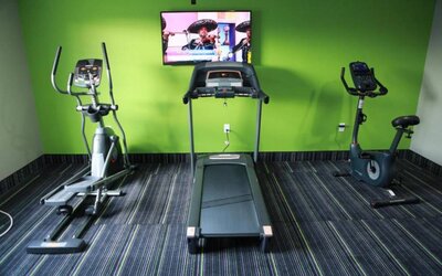 Fitness center available at Home Inn & Suites.