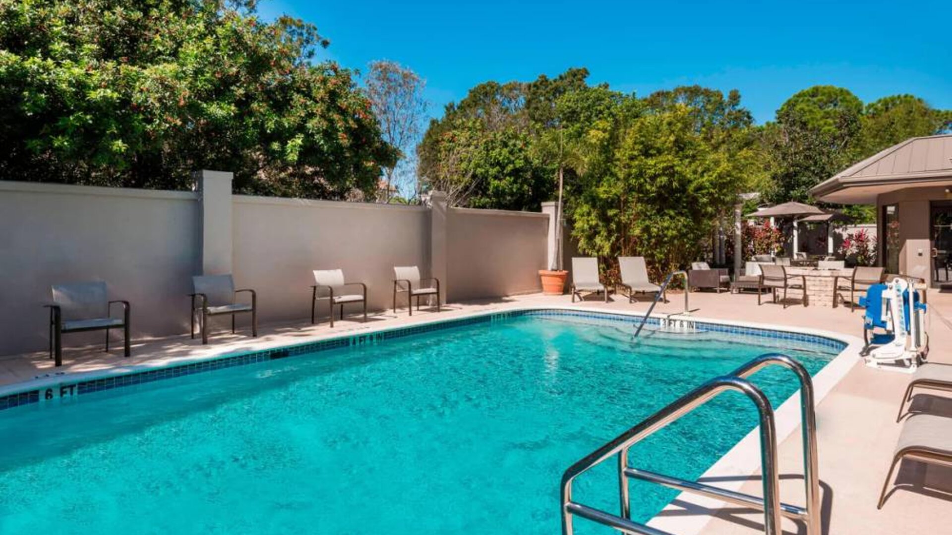 Refreshing outdoor pool at Courtyard By Marriott Sarasota Bradenton Airport.