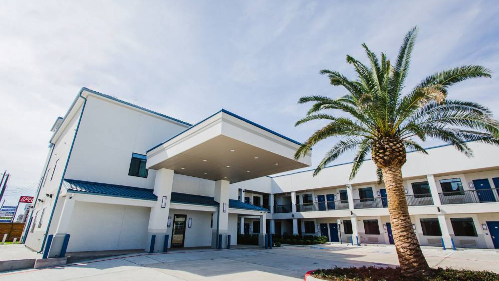 Hotel exterior at Palace Inn Blue Gessner.