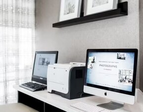 Business center with PC and printer at The Hollis Halifax - A DoubleTree Suites By Hilton.