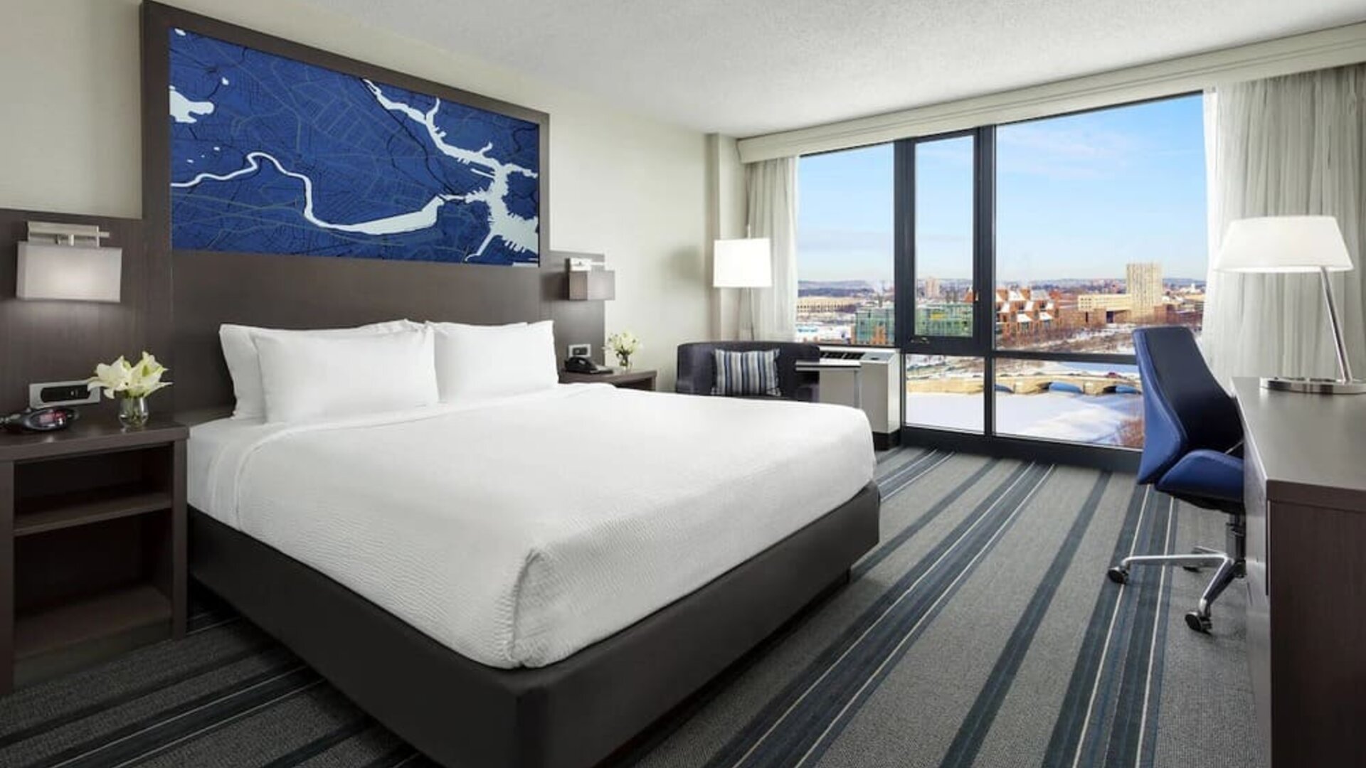 Spacious delux king with lots of natural light and business desk at Courtyard Boston Cambridge.