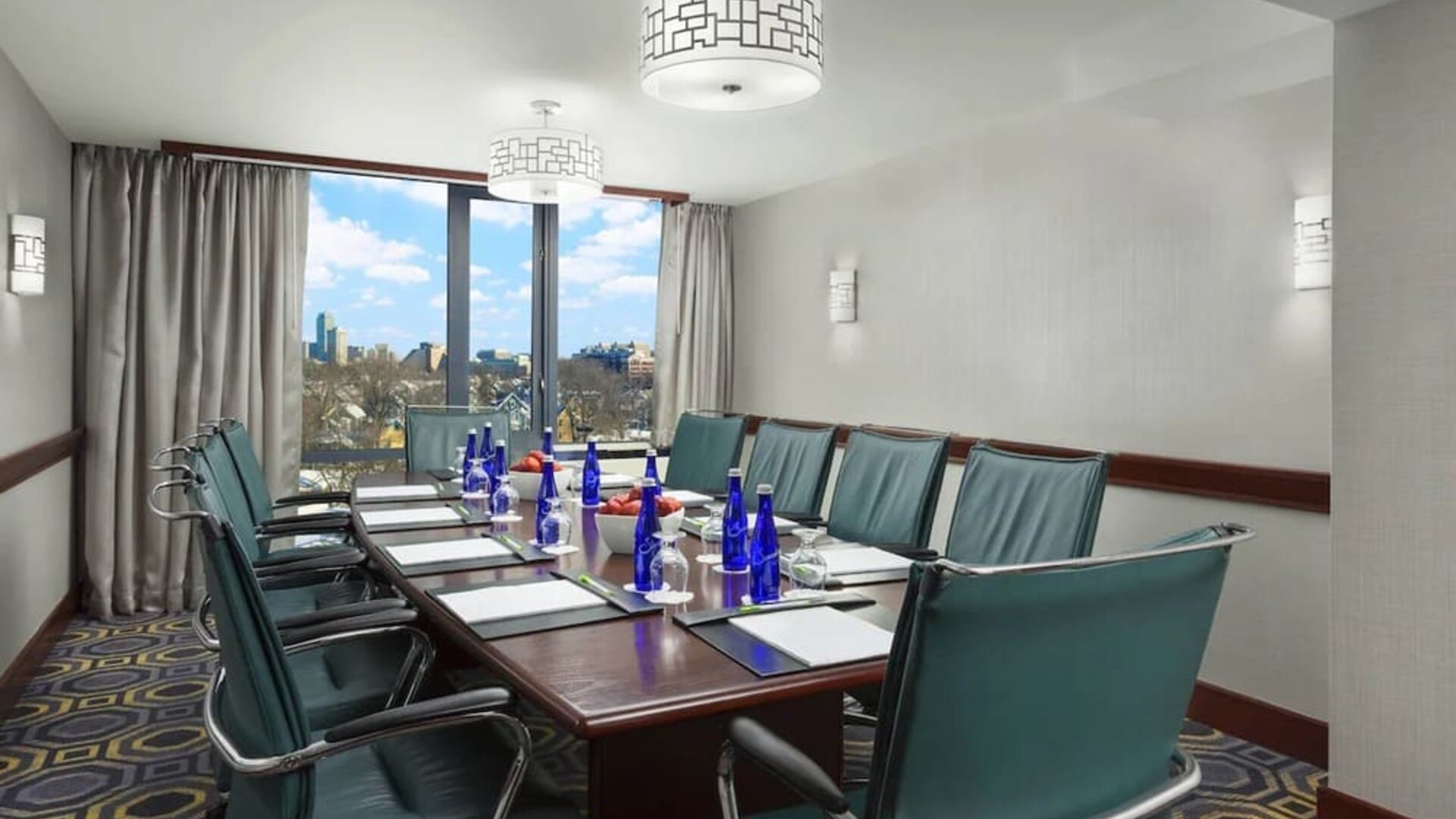 Professional meeting room with natural light at Courtyard Boston Cambridge.