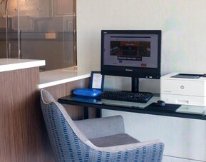 Dedicated business center with PC, internet, and printer at Holiday Inn Express & Suites Boston-Cambridge.