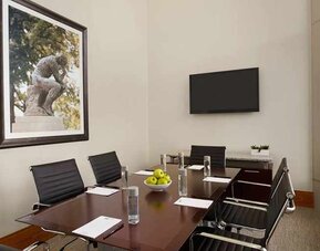 Professional and bright-lit meeting room ideal for all business meetings at Homewood Suites by Hilton University City.