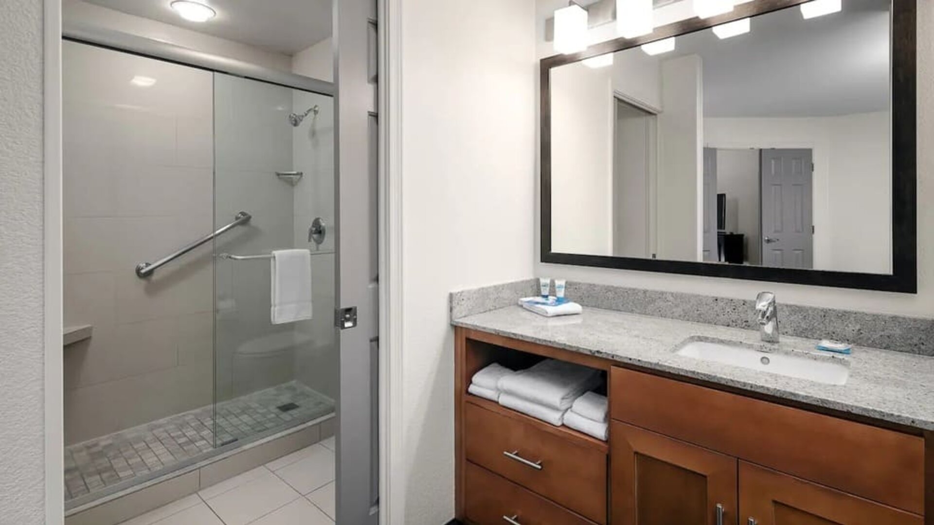 Private guest bathroom with shower at Hyatt House Scottsdale.