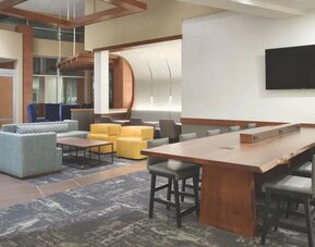 Lobby and coworking lounge at Hyatt Place Portland Airport At Cascade Station.