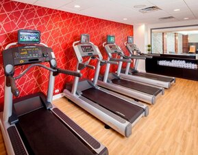 Well equipped fitness center at Courtyard By Marriott Boston Brookline.