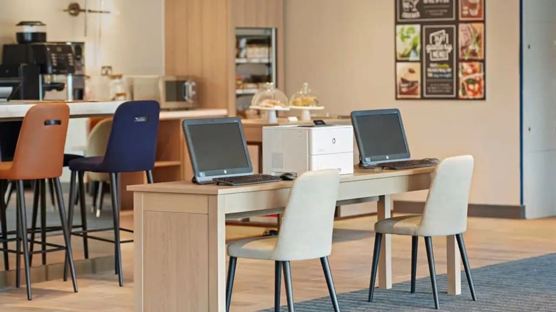 Business center with PC, internet, and printer at Hyatt Place London Heathrow Airport.