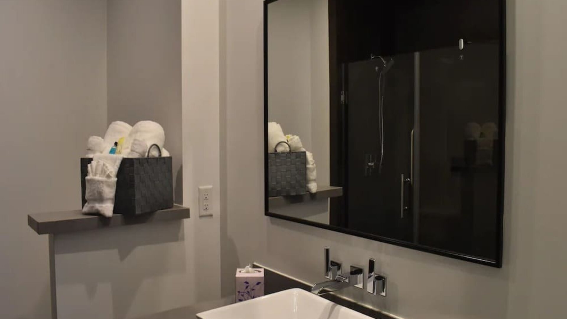 Private guest bathroom with shower at Hotel Bella.