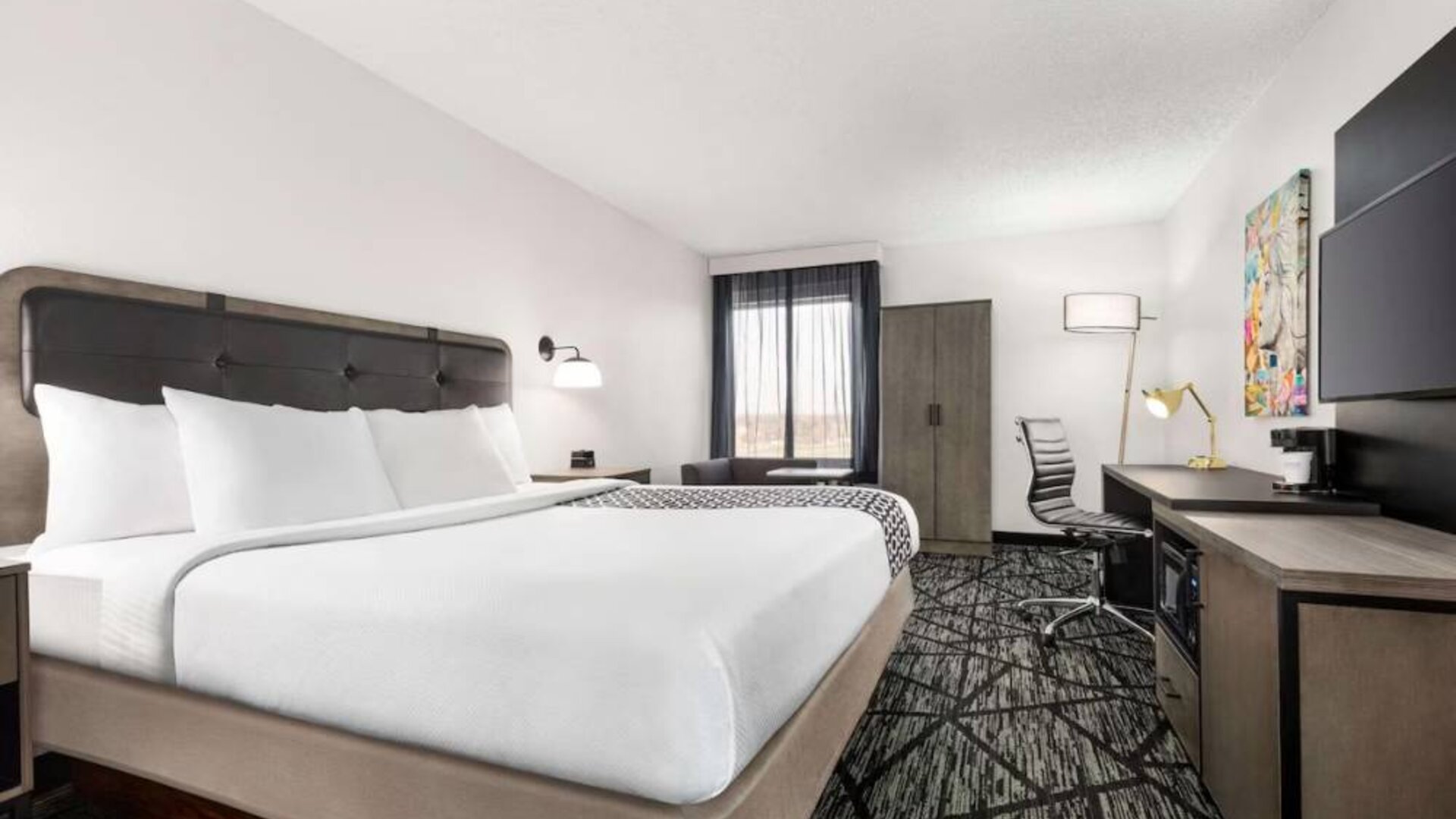 Day use room with work desk at La Quinta Inn & Suites Cleveland Airport West.
