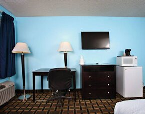 Day use room amenities at Coratel Inn & Suites By Jasper Newton.