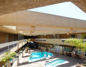 Refreshing outdoor pool at The Pacific Inn.