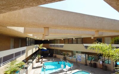 Refreshing outdoor pool at The Pacific Inn.