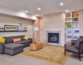 Lobby and coworking lounge at Country Inn & Suites Chicago/Tinley Park.