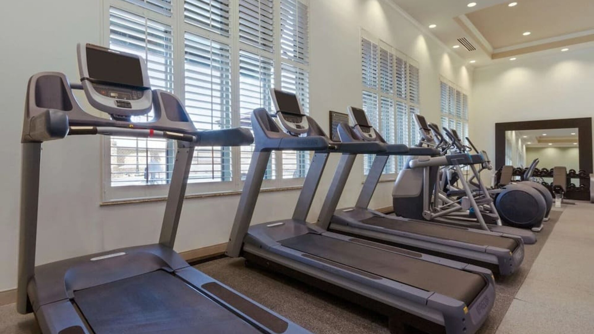 Well equipped fitness center at Embassy Suites By Hilton Savannah.