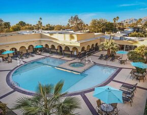 Refreshing outdoor pool at La Quinta Inn & Suites Tucson Reid Park.