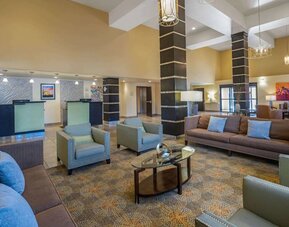 Lobby and coworking lounge at La Quinta Inn & Suites Tucson Reid Park.