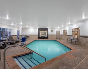 Refreshing indoor pool at AmericInn By Wyndham Sioux Falls North.
