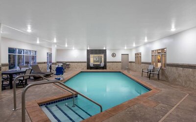 Refreshing indoor pool at AmericInn By Wyndham Sioux Falls North.