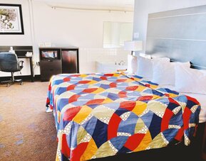 Day use room with bathtub at Coratel Inn & Suites By Jasper Northfield.