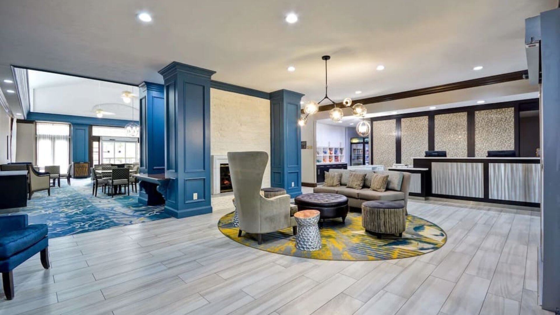 Lobby and coworking space at Homewood Suites By Hilton Dallas-Lewisville.
