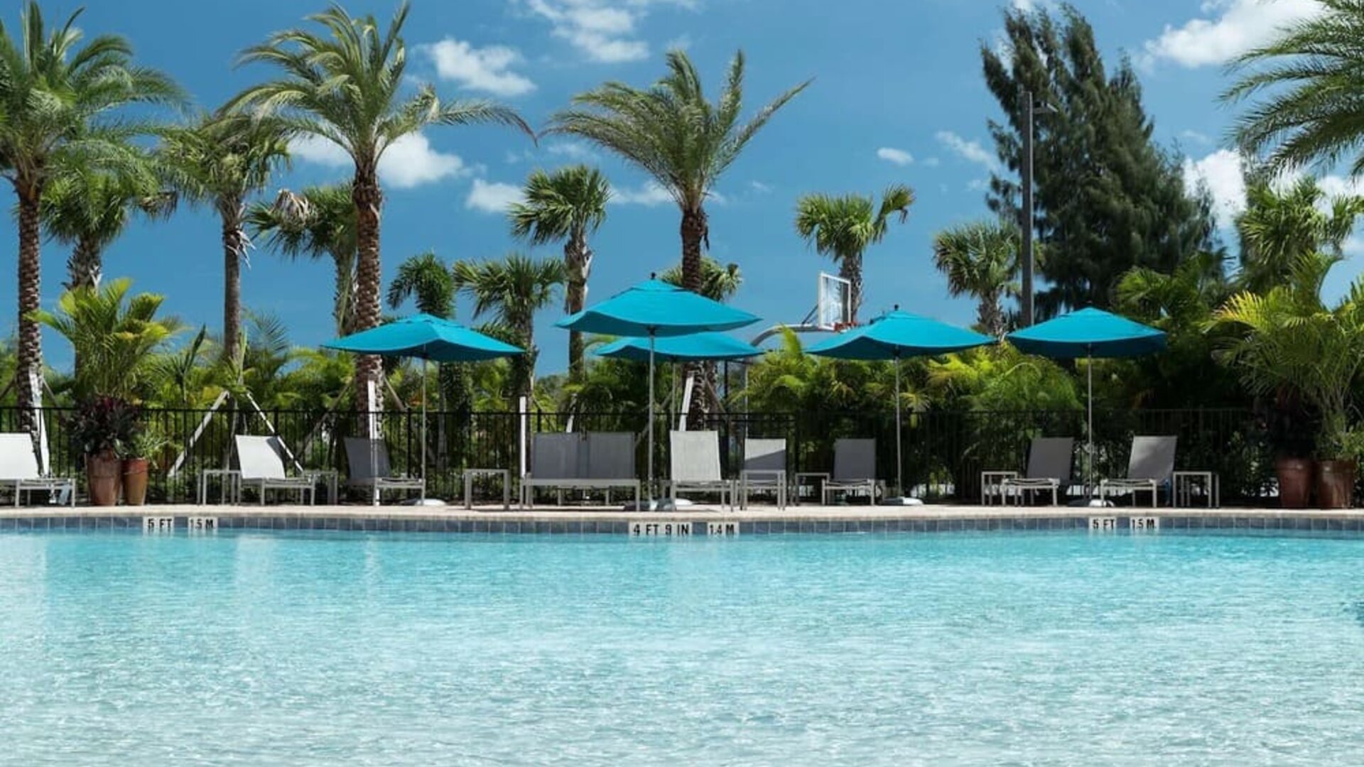 Large outdoor pool at Hampton Inn & Suites Cape Canaveral Cruise Port.