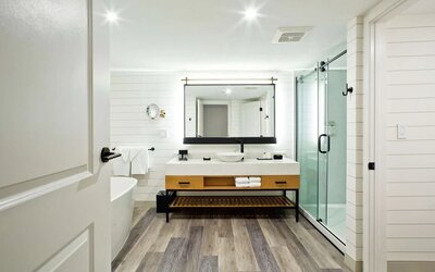 Private guest bathroom with shower at The Inn At Saratoga, Tapestry Collection By Hilton.