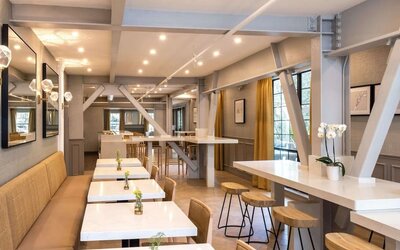 Dining and coworking space at The Inn At Saratoga, Tapestry Collection By Hilton.