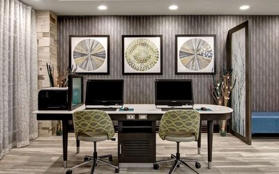 Business center with PC, internet, and printer at Homewood Suites By Hilton Burlington.