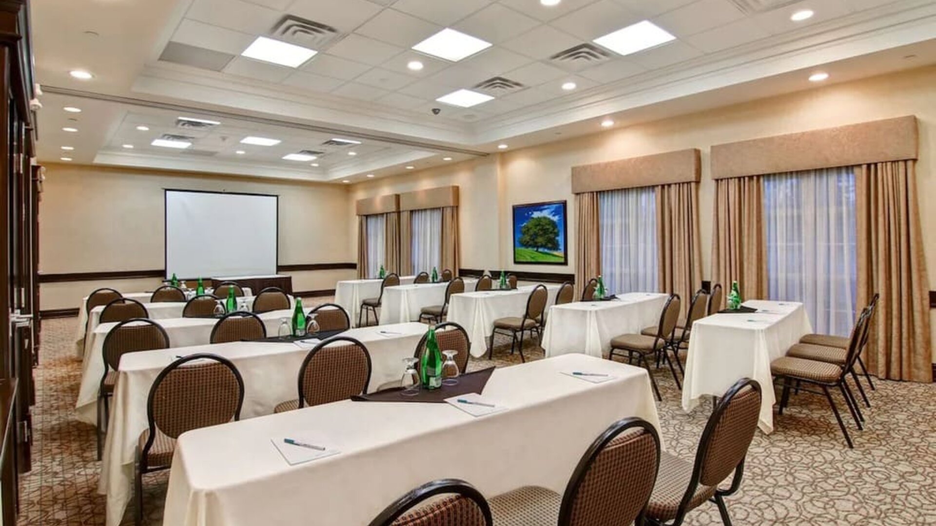 Professional meeting room at Homewood Suites By Hilton Burlington.