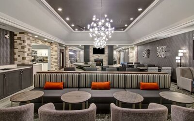 Lounge and coworking space at Homewood Suites By Hilton Burlington.
