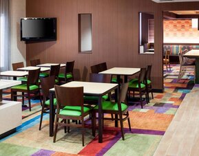 Dining area perfect for coworking at Fairfield Inn By Marriott Santa Clarita Valencia.
