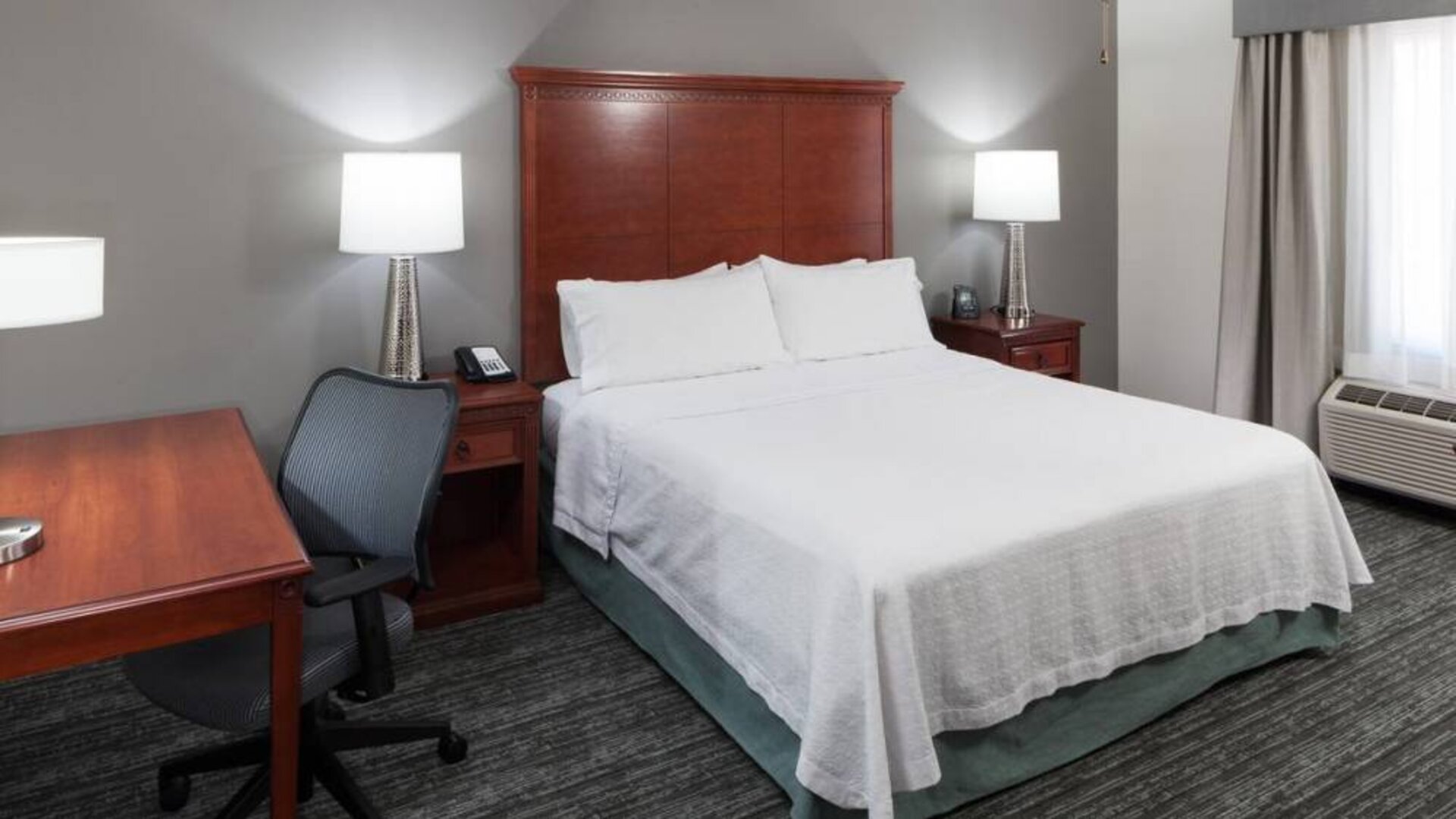 Day use room with work desk at Homewood Suites By Hilton Denton.