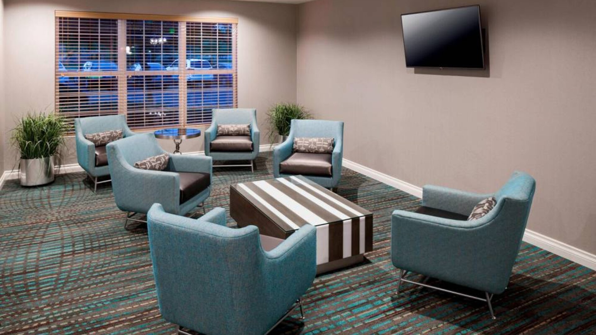 Lobby and coworking lounge at Residence Inn By Marriott Denver Highlands Ranch.