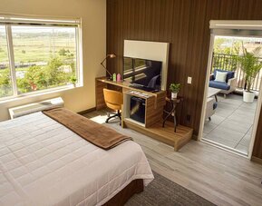 Day use room with balcony at Wyndham Garden North Bergen Near Secaucus.
