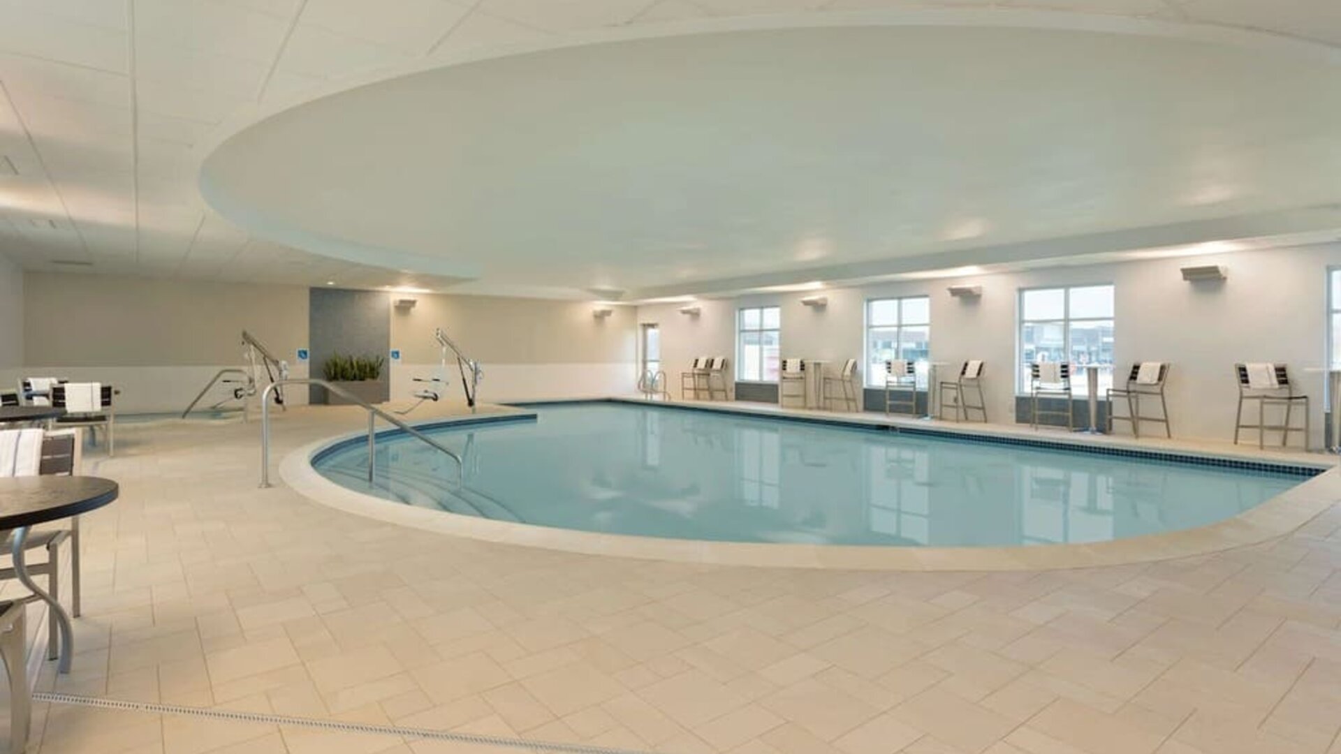 Relaxing indoor pool at Hampton Inn & Suites Rosemont Chicago O'Hare.