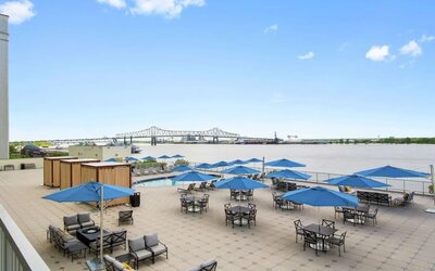 Lovely outdoor terrace and coworking space at Hilton Baton Rouge Capitol Center.