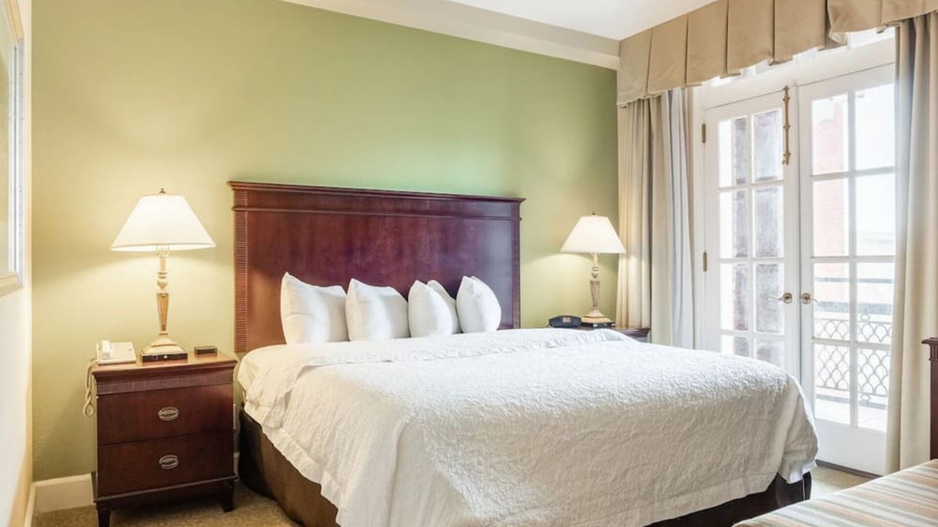 Delux king room with natural light at Hampton Inn & Suites Birmingham-Downtown-Tutwiler.